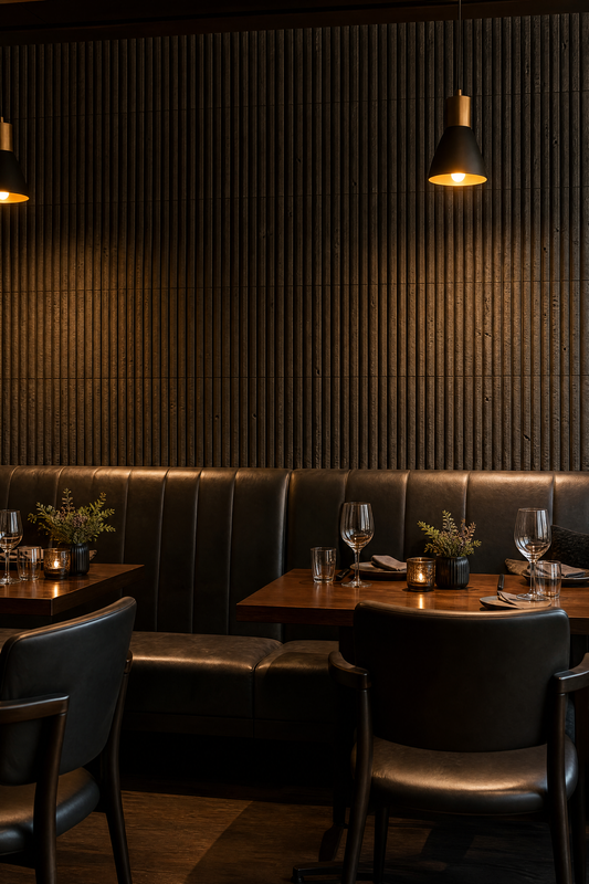 Black lava stone strip mosaic feature wall in upscale restaurant dining room